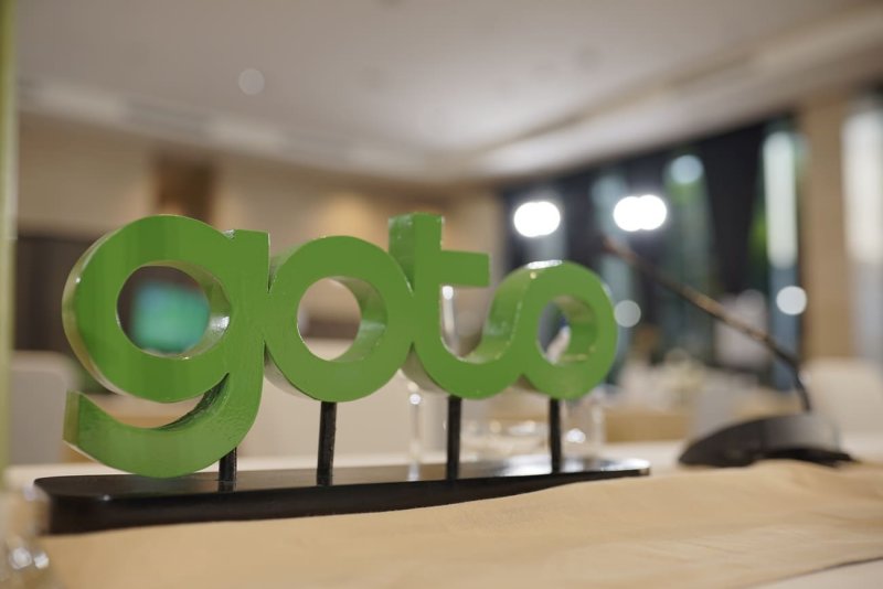 Kantor pusat GoTo di Jakarta dengan tampilan modern melambangkan pertumbuhan dan pencapaian laba pertama perusahaan di tahun 2025